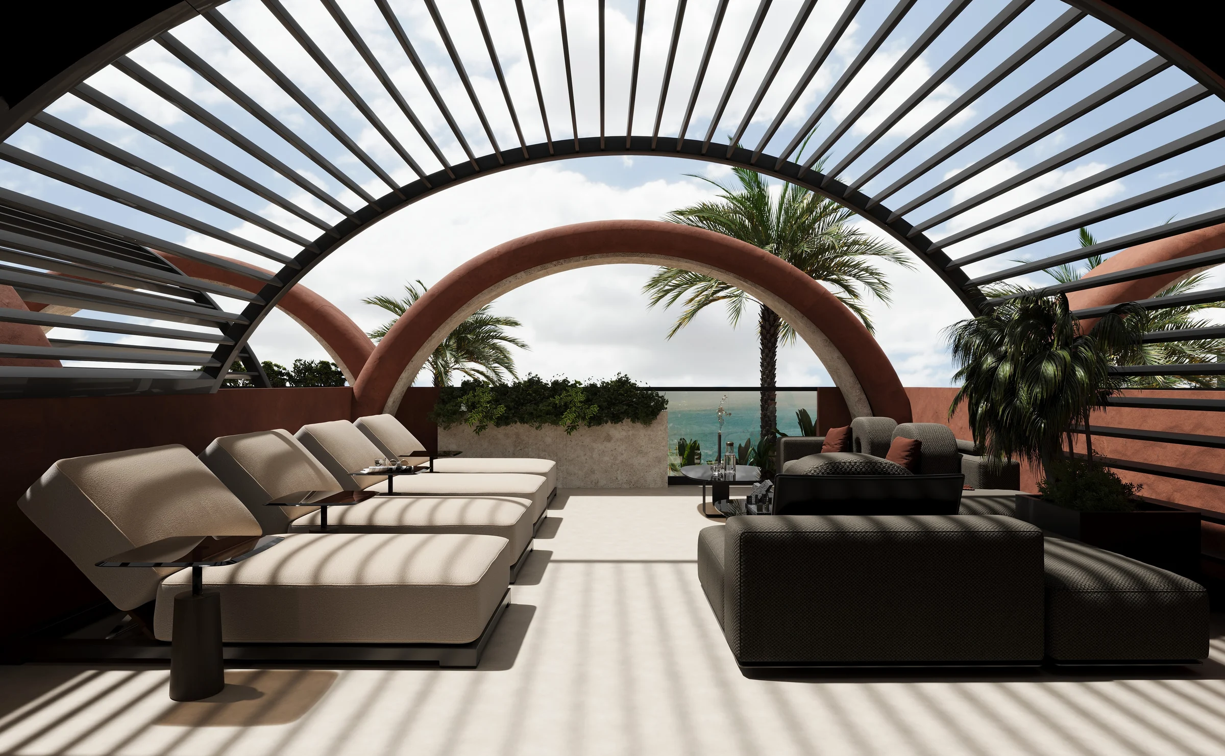 Pool terrace with loungers and ocean view at Eighth Sense, Bali